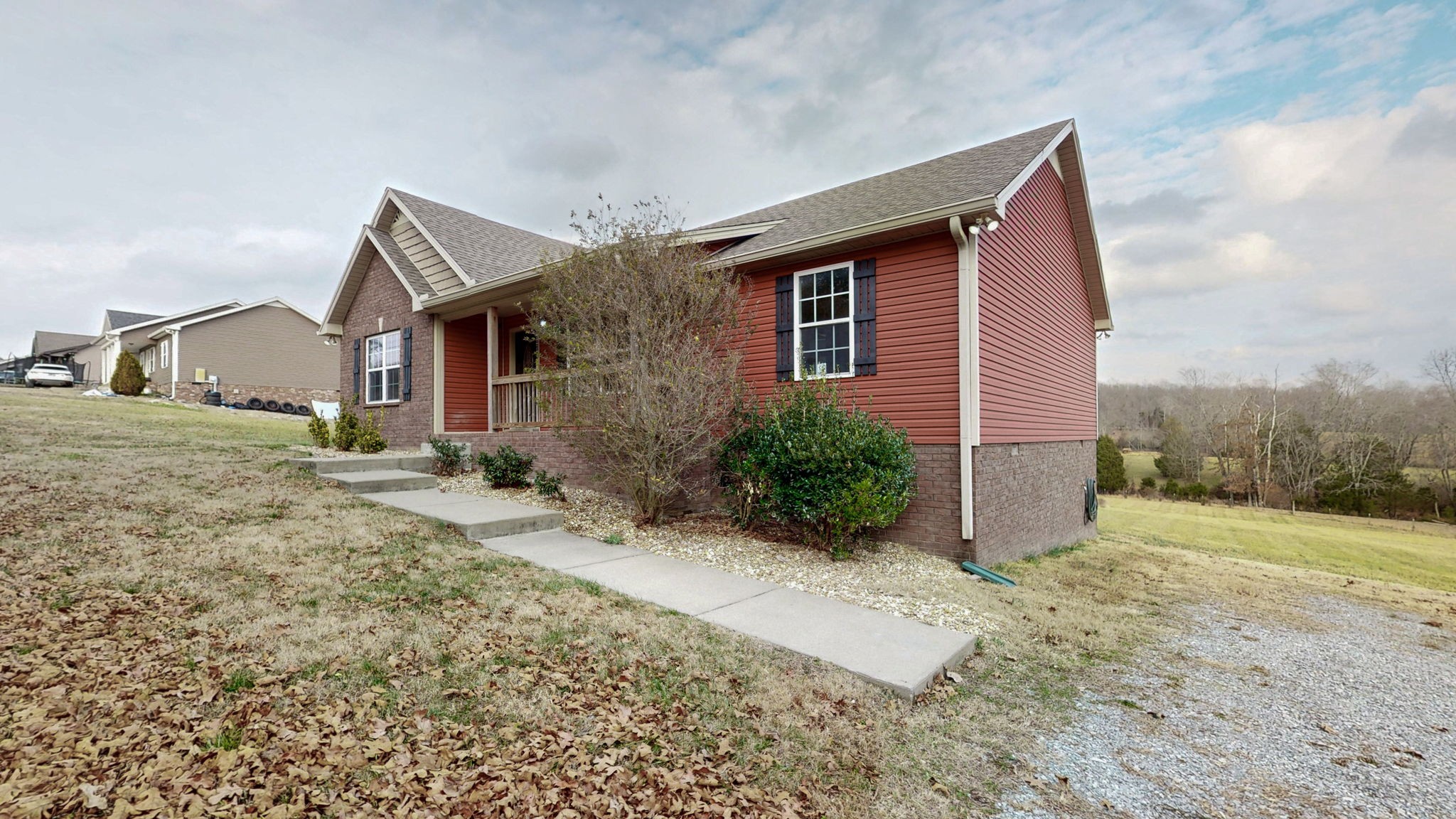 574 Keytown Road Portland, TN 37148 - Photo 3 of 45 a front view of house with yard and trees around