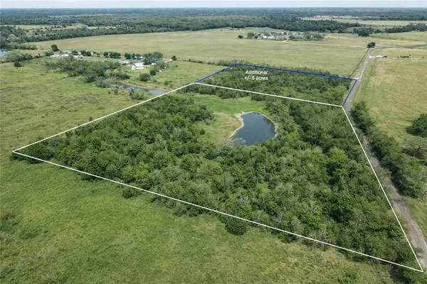 a view of a lake with a outdoor space