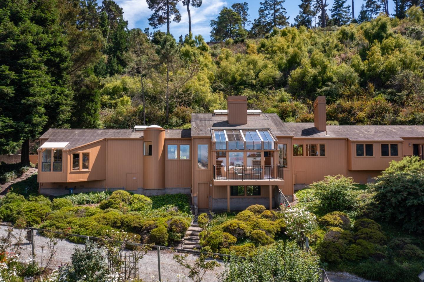 540 Aguajito Road Carmel, CA 93923 - Photo 27 of 32 an aerial view of a house with a garden