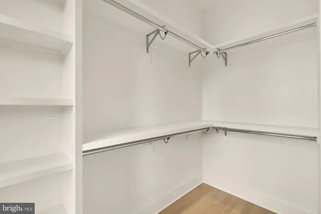 a view of a room with racks on the wall