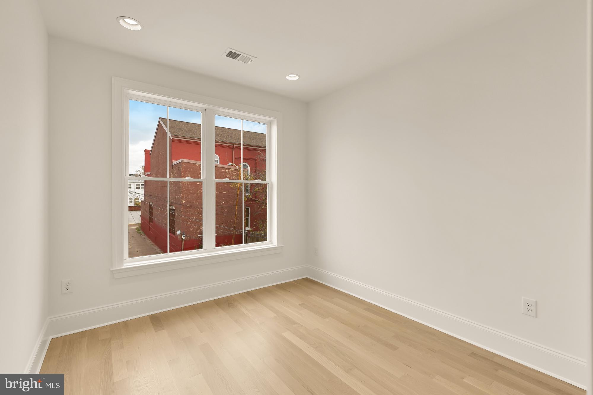 1010 I Street Northeast Washington, DC 20002 - Photo 31 of 51 a view of an empty room with a window