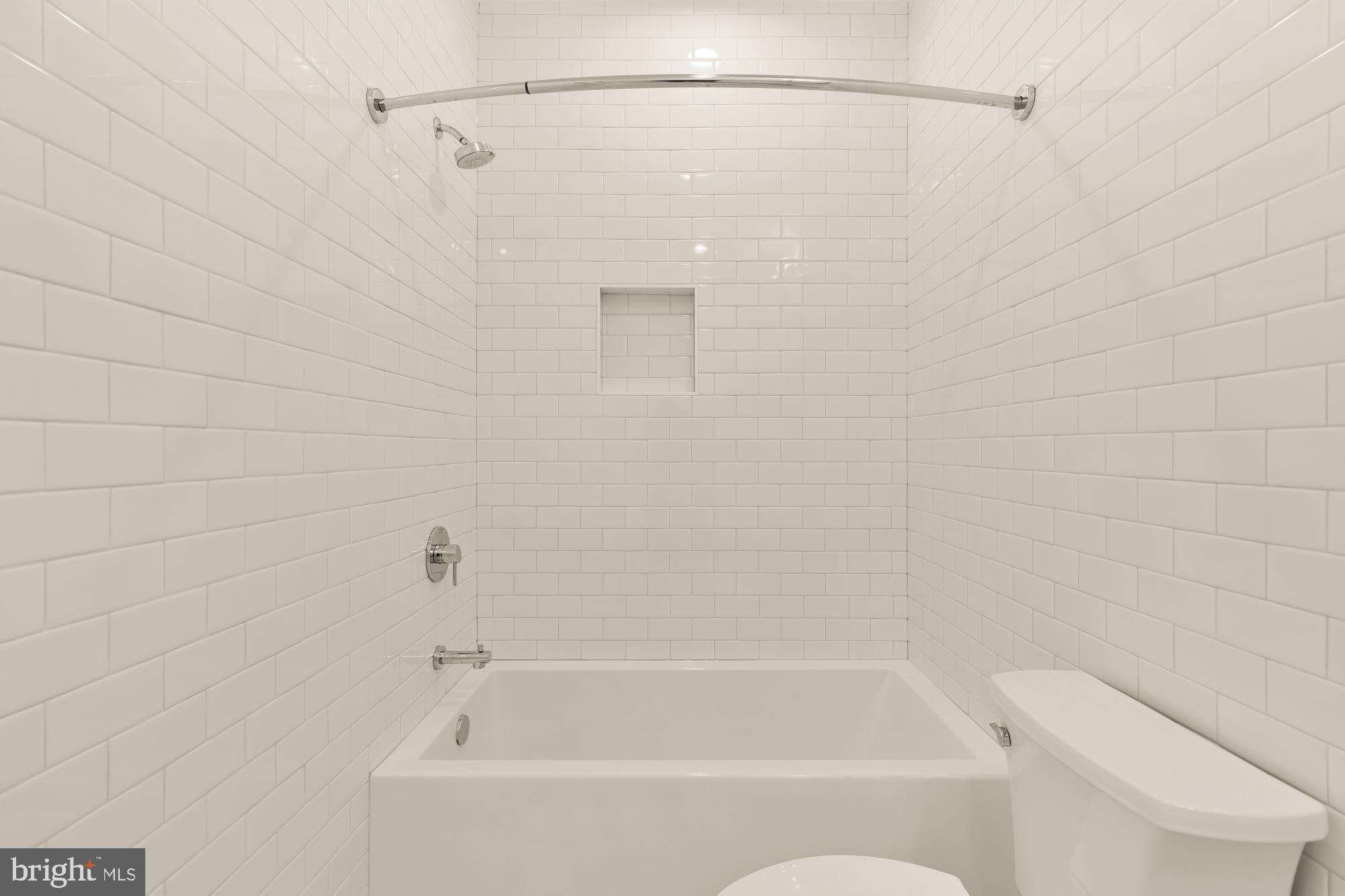 1010 I Street Northeast Washington, DC 20002 - Photo 35 of 51 a bathroom with a bathtub and a shower