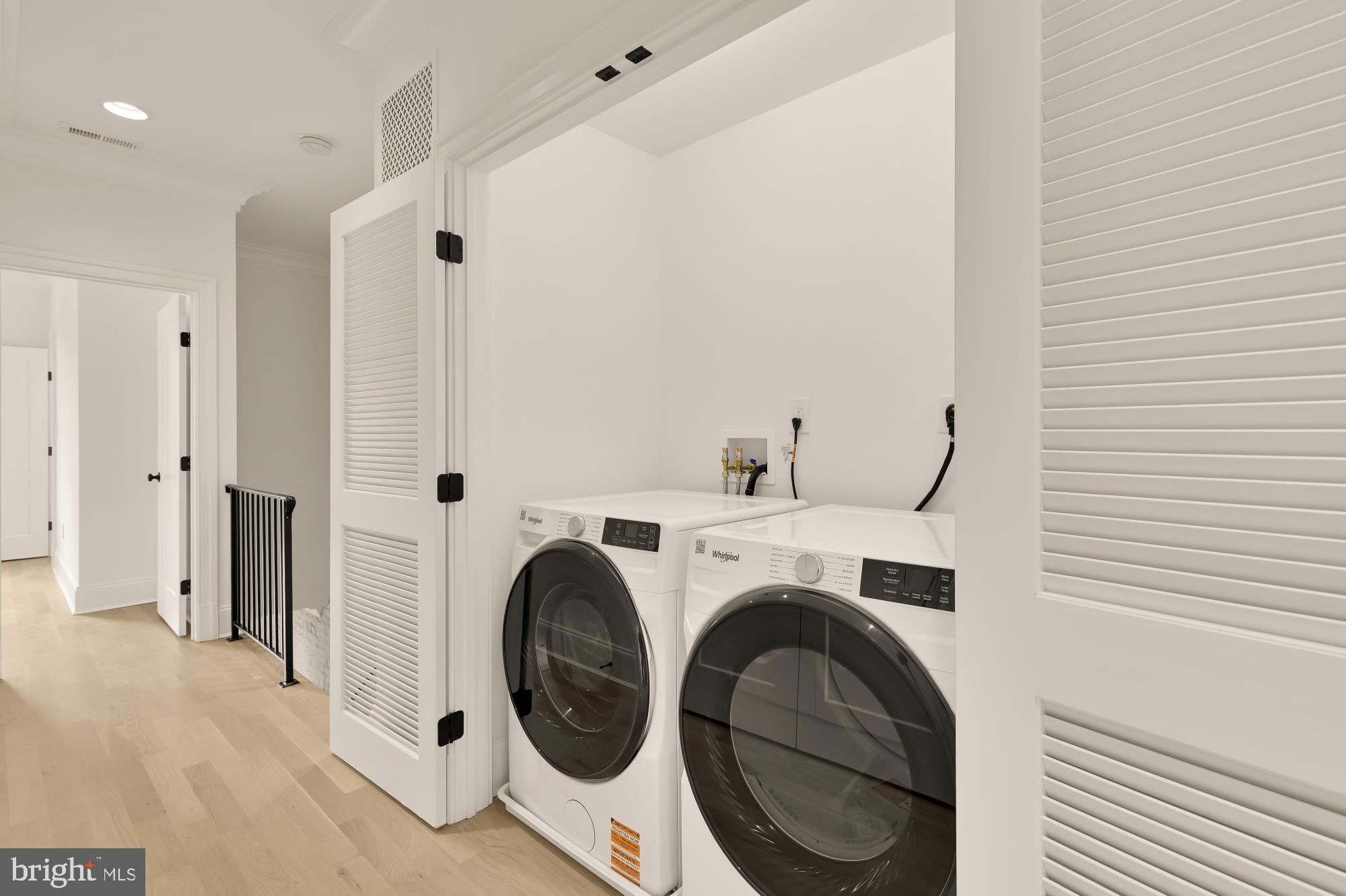 1010 I Street Northeast Washington, DC 20002 - Photo 36 of 51 a view of a storage & utility room with dryer and washer