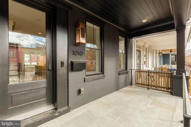 a view of a hallway with a glass door