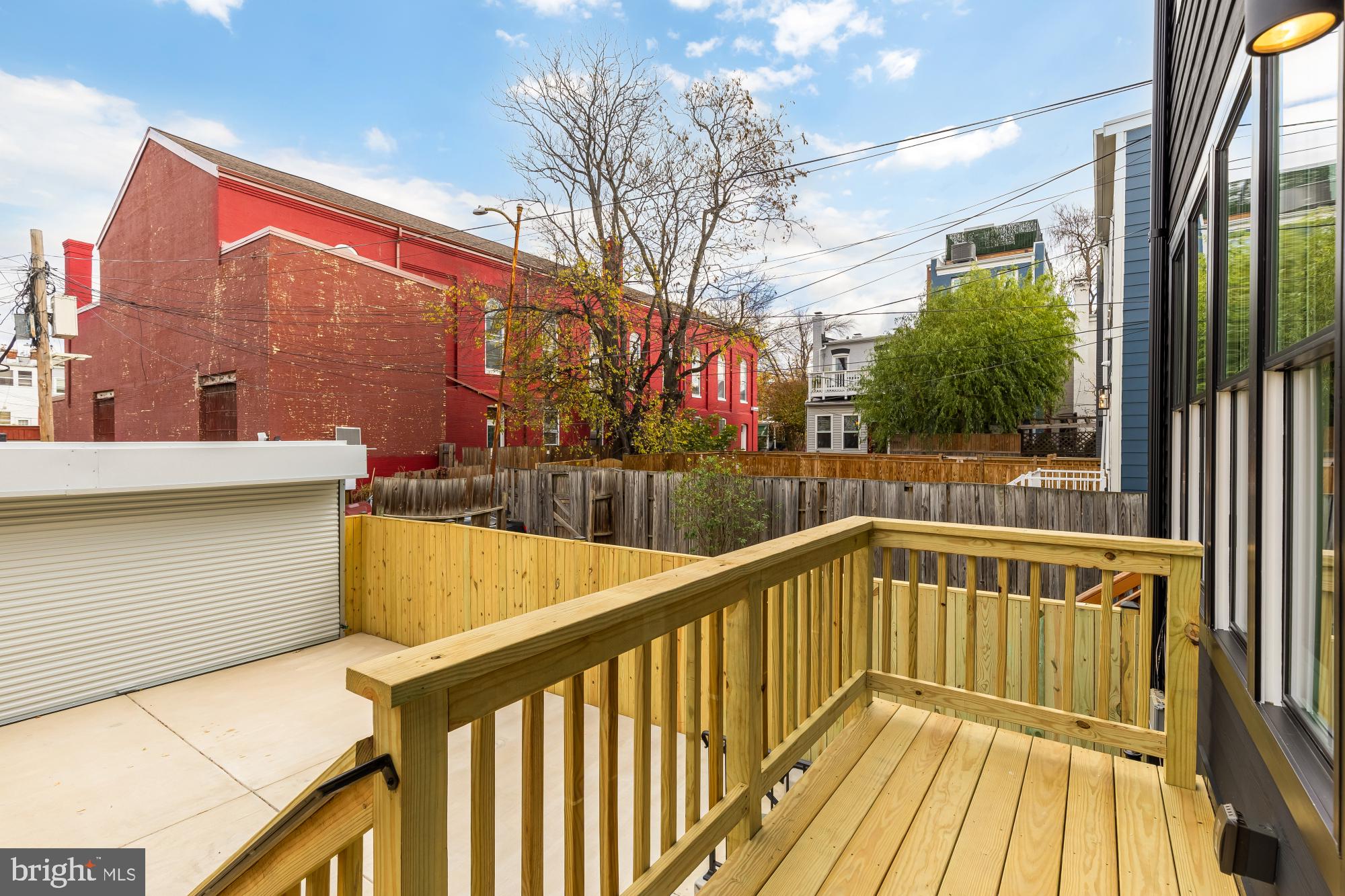 1010 I Street Northeast Washington, DC 20002 - Photo 47 of 51 a view of balcony with wooden floor and fence