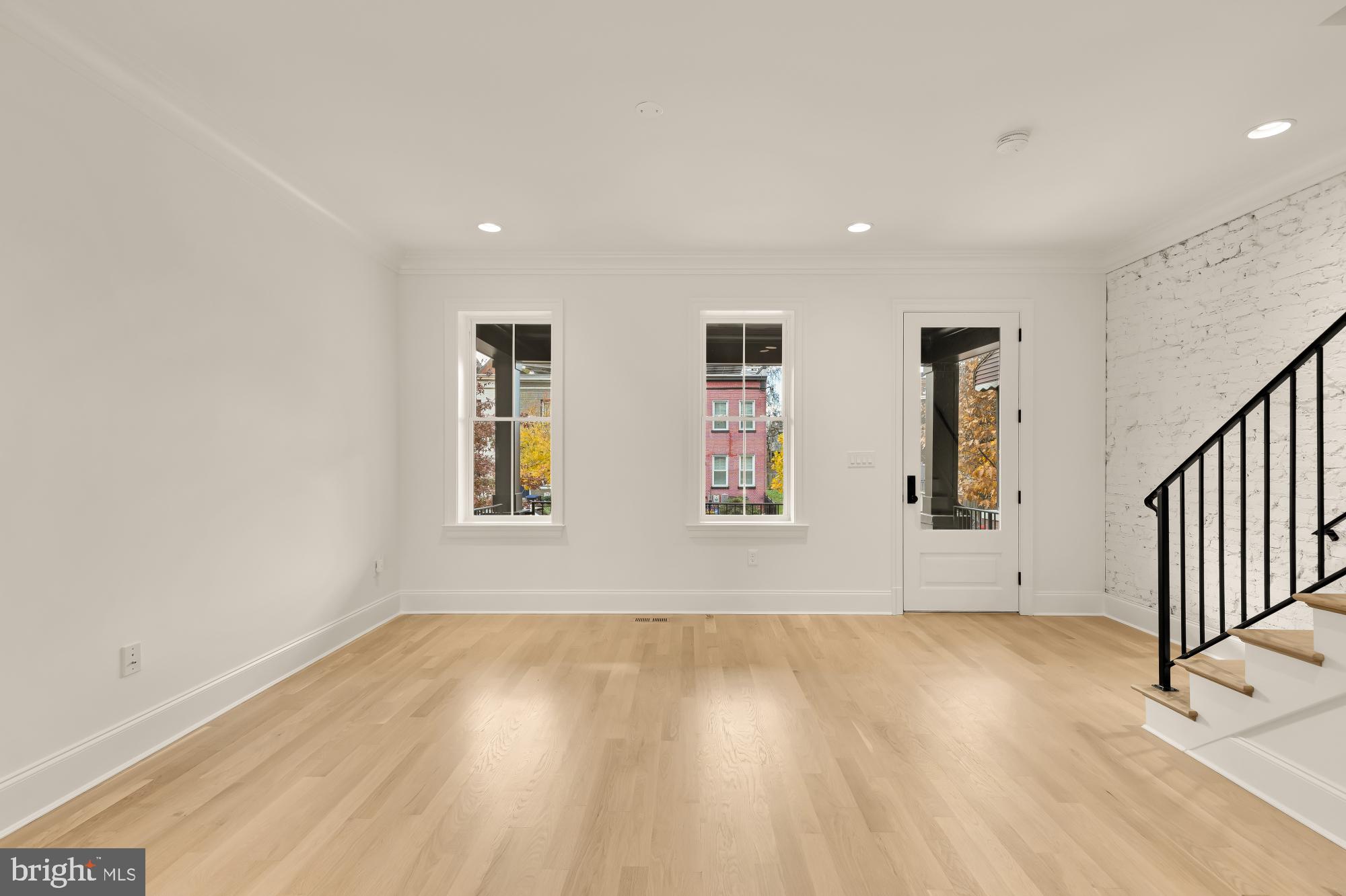1010 I Street Northeast Washington, DC 20002 - Photo 9 of 51 a view of wooden floor and windows in a room