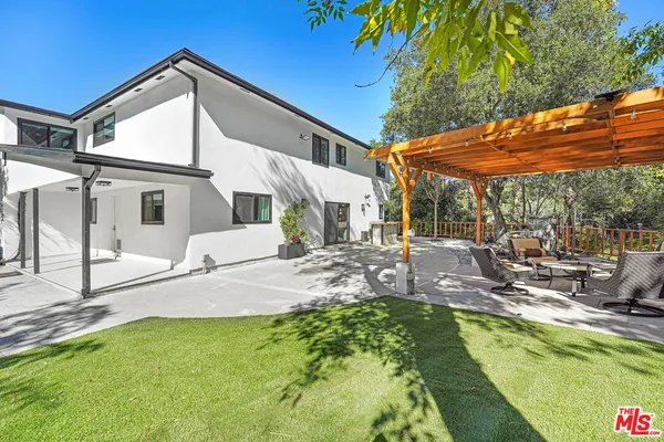 a view of residential house with outdoor space