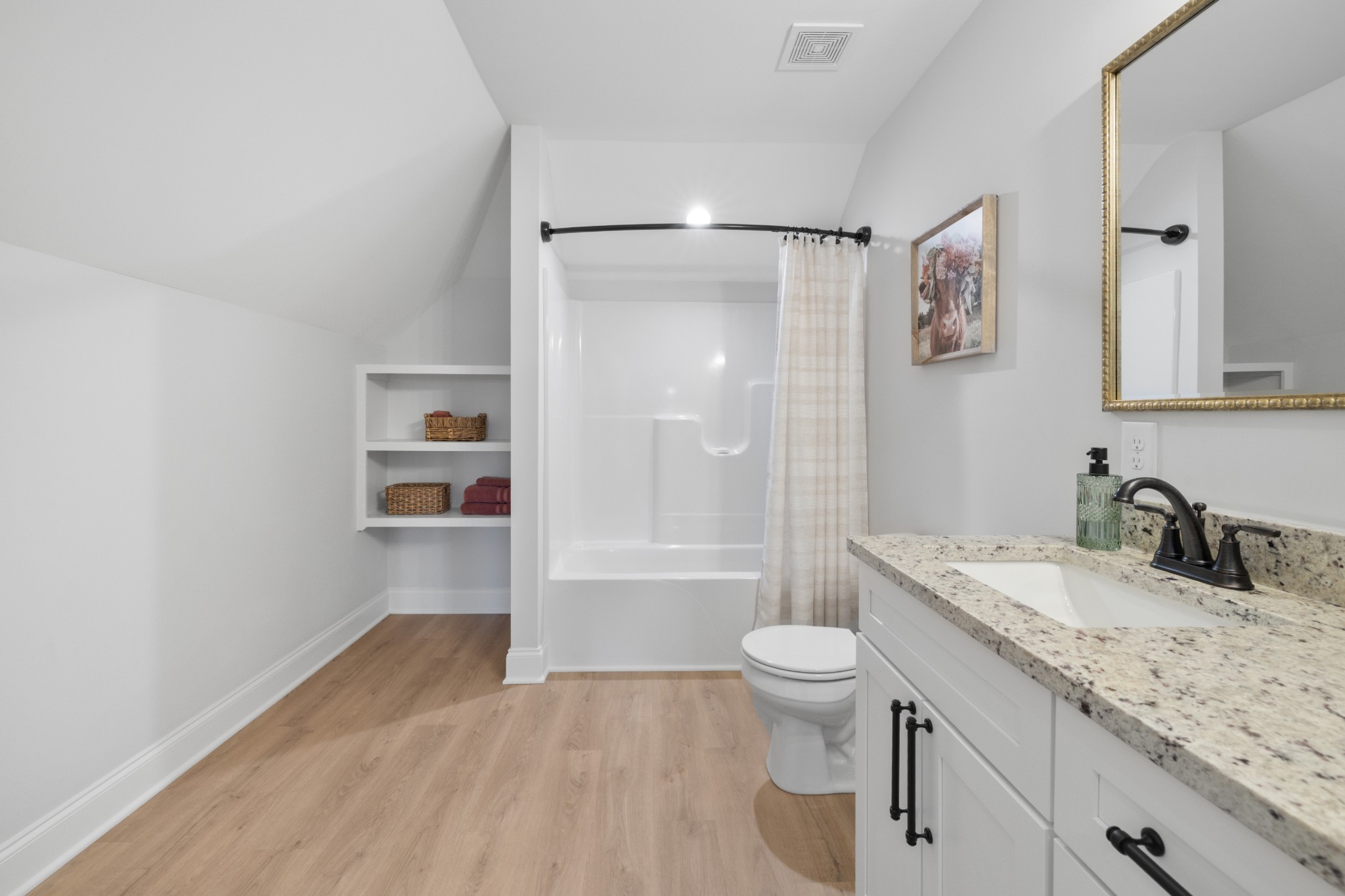 1314 Halls Mill Road Unionville, TN 37180 - Photo 29 of 35 a bathroom with a granite countertop sink a toilet and shower