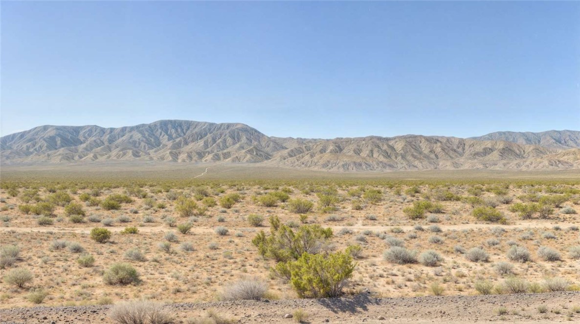 777 One Whole Spring Road Landers, CA 92285 - Photo 1 of 1 a view of mountain with lake view
