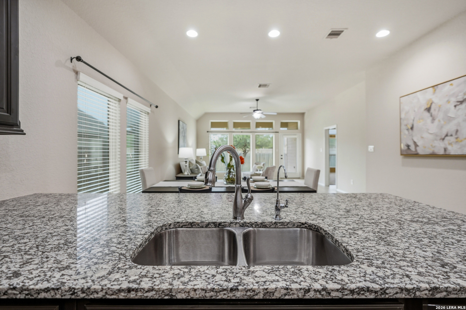 2129 Range Road Seguin, TX 78155 - Photo 17 of 41 a view of kitchen sink a faucet cabinets and stainless steel appliances