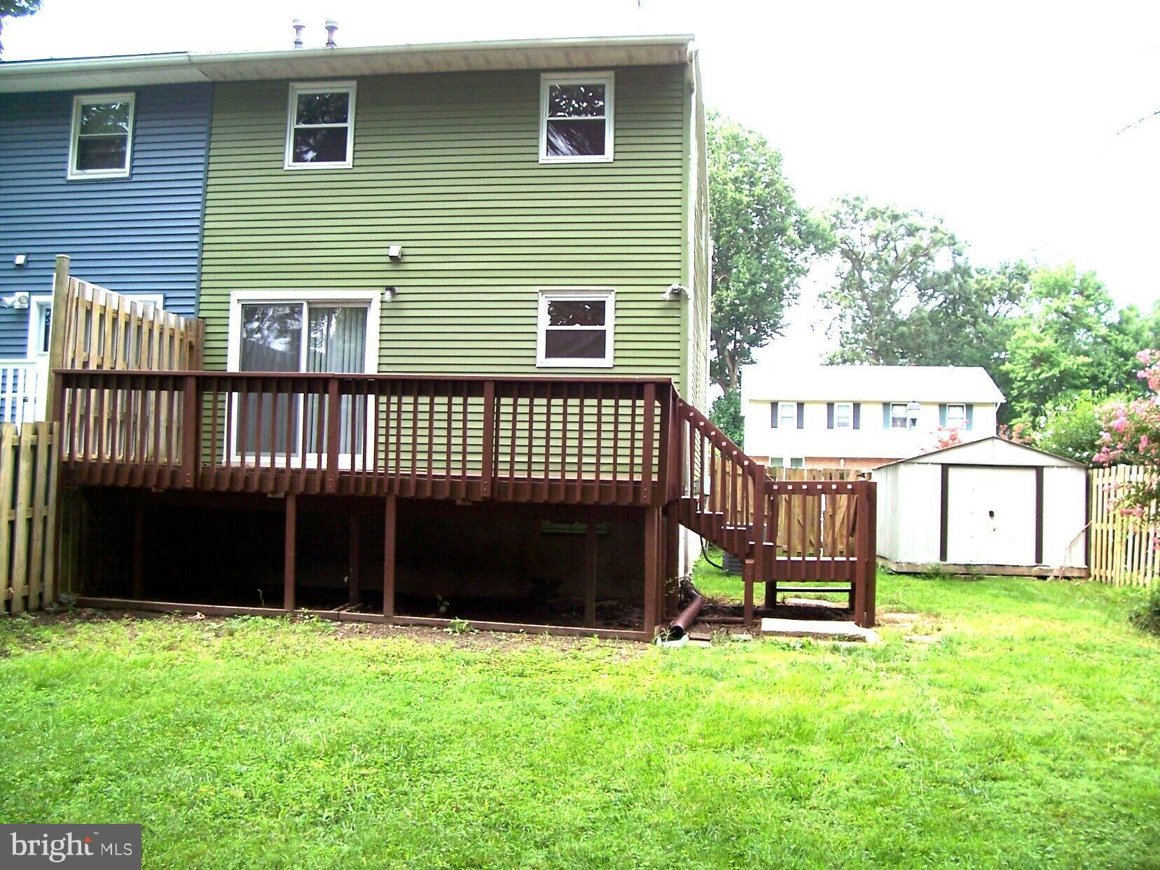 303 Redbud Road Edgewood, MD 21040 - Photo 15 of 16 a view of a house with a yard and deck