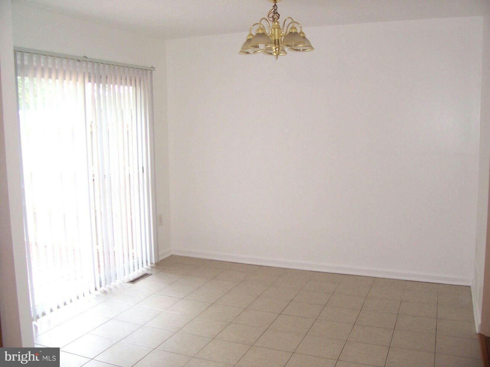 303 Redbud Road Edgewood, MD 21040 - Photo 5 of 16 an empty room with a window