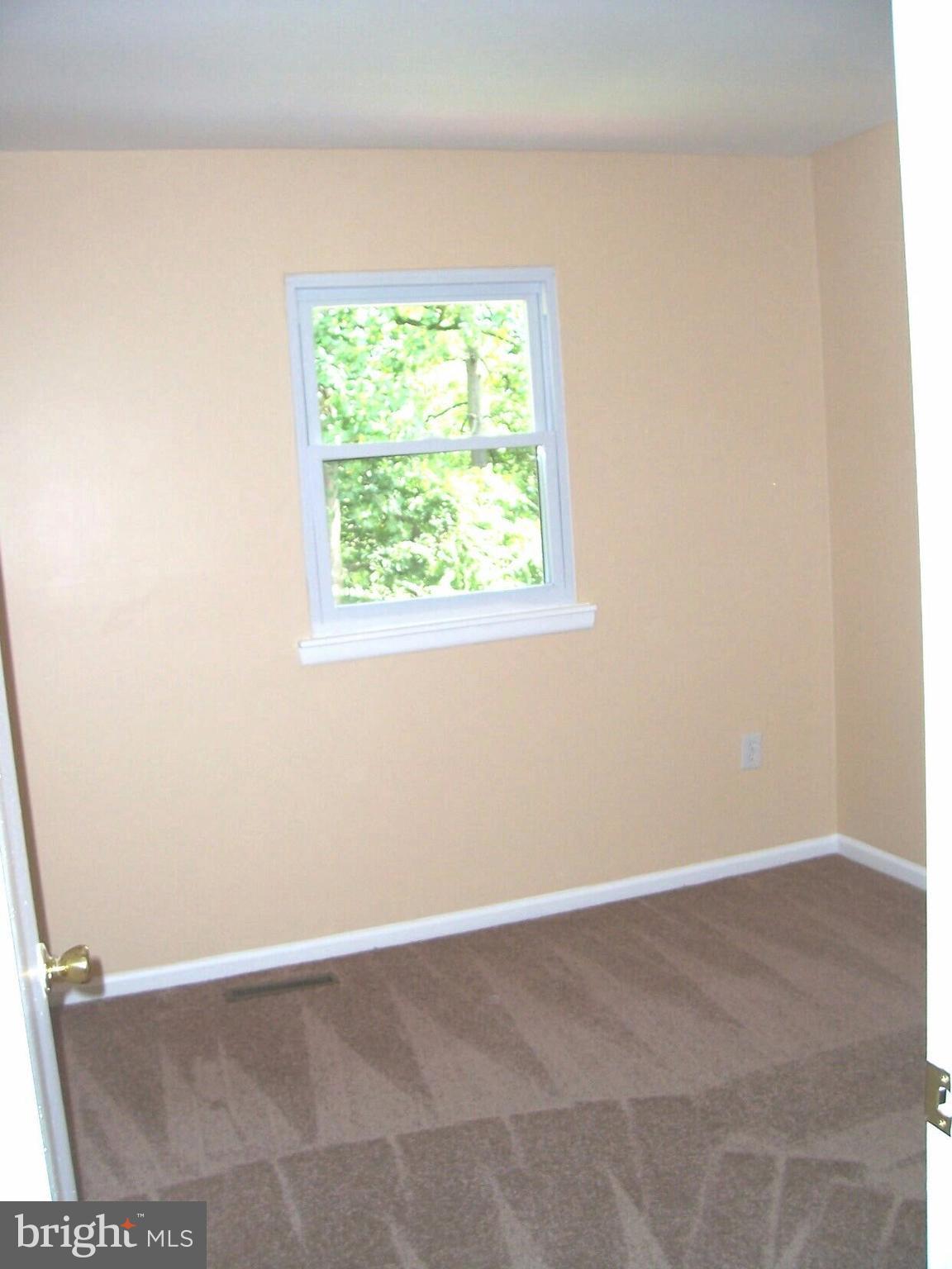 303 Redbud Road Edgewood, MD 21040 - Photo 9 of 16 an empty room with a window
