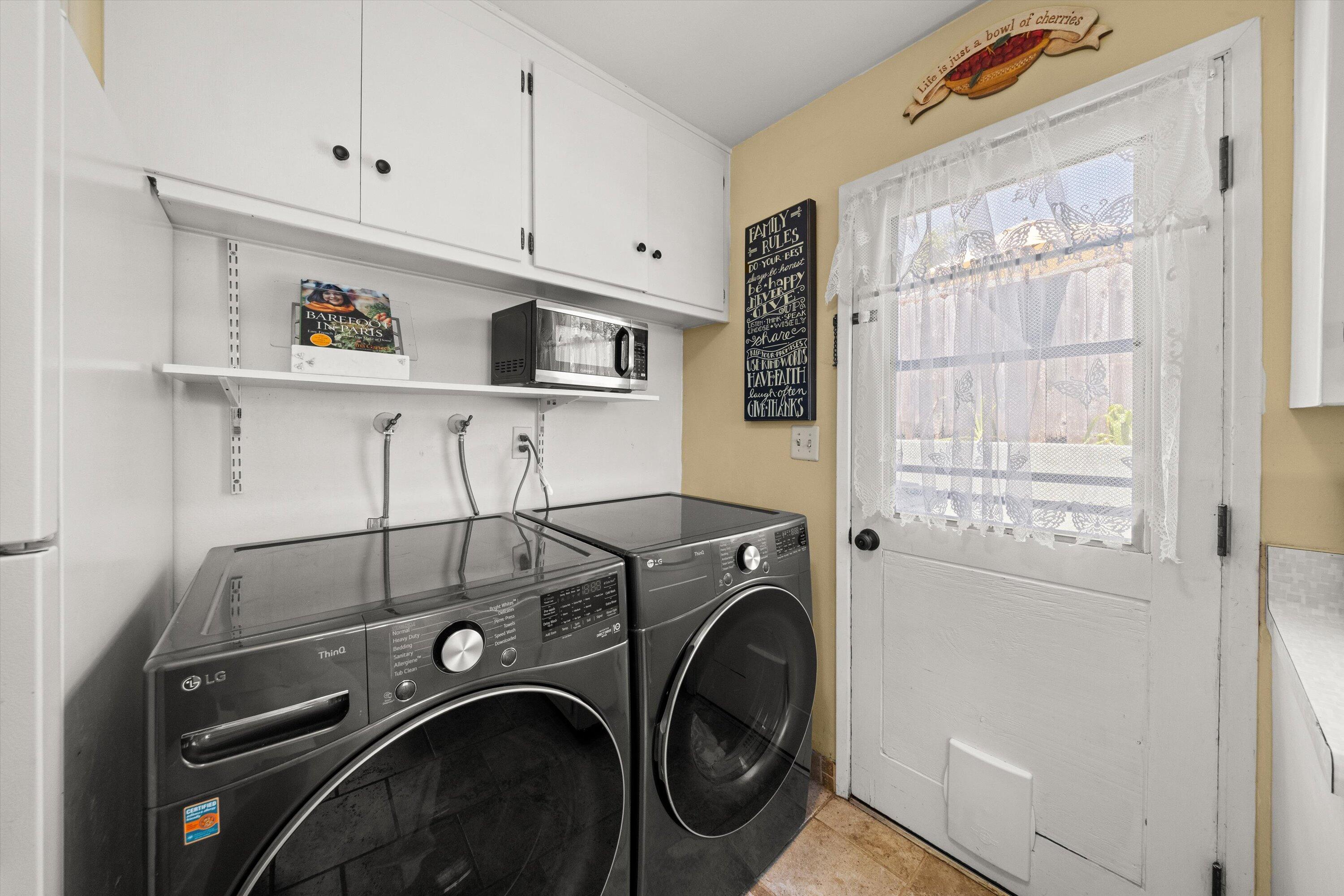231 Salida Del Sol Santa Barbara, CA 93109 - Photo 12 of 30 a utility room with dryer and washer
