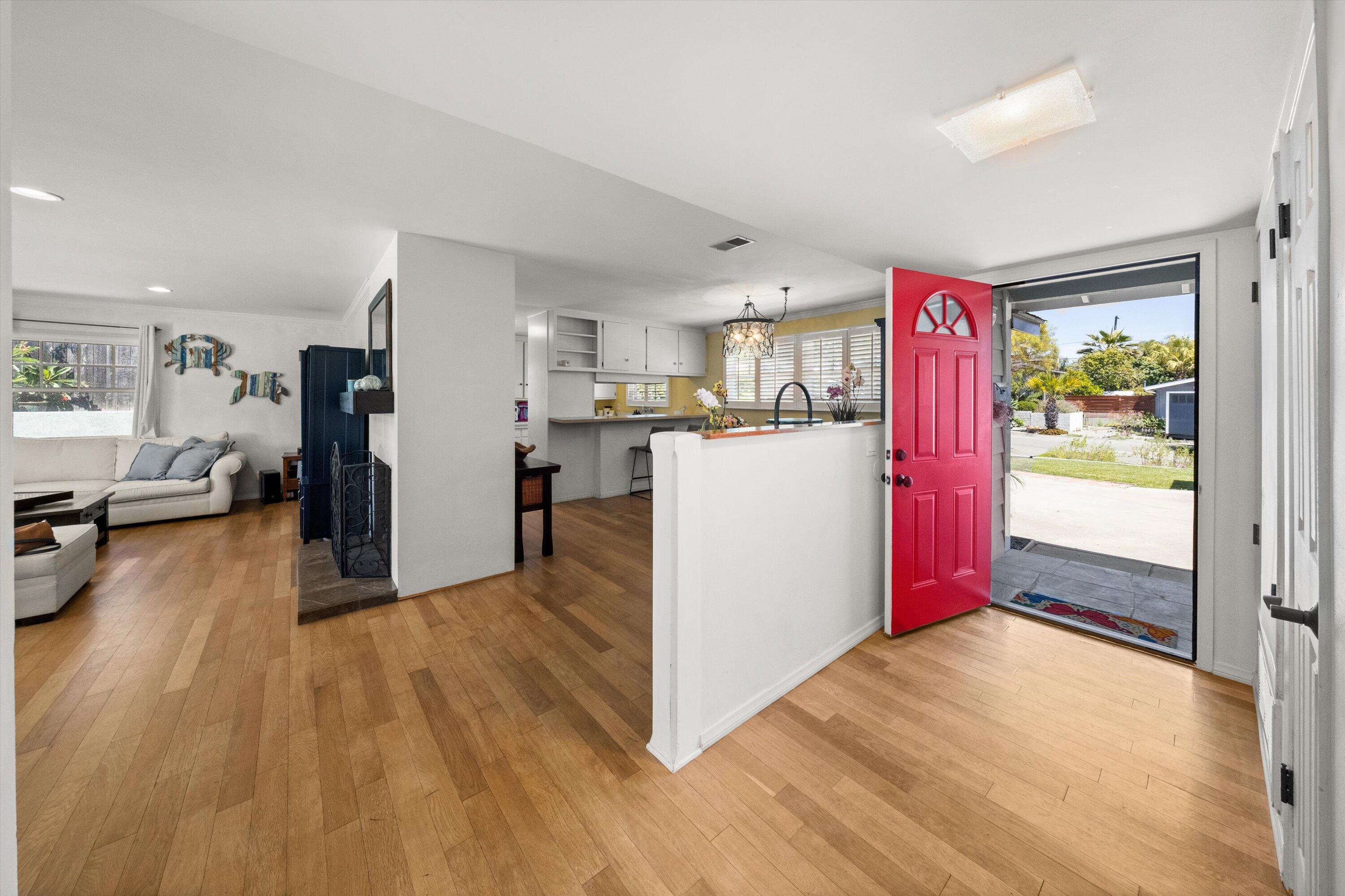 231 Salida Del Sol Santa Barbara, CA 93109 - Photo 3 of 30 a view of a kitchen with refrigerator and wooden floor