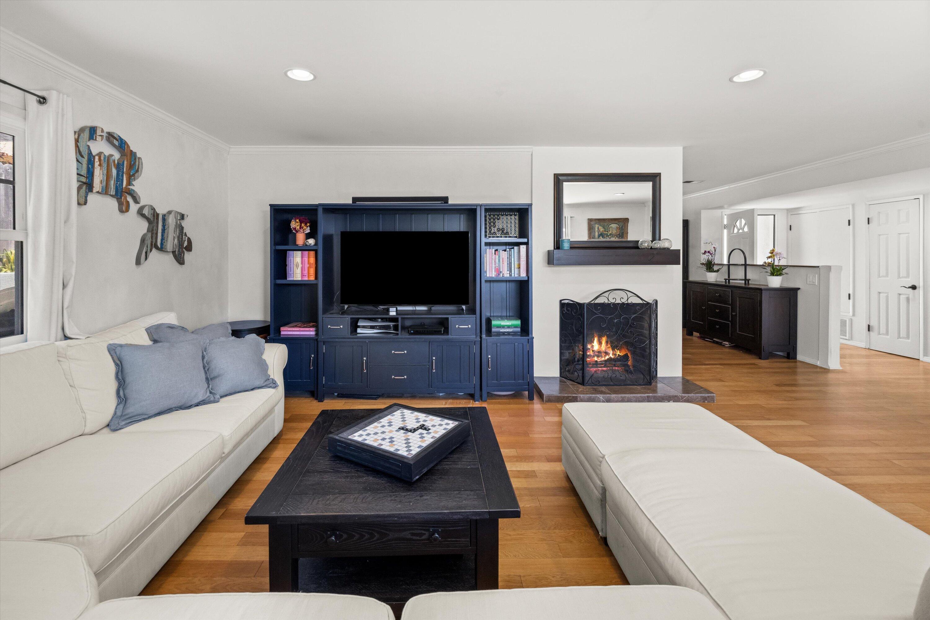 231 Salida Del Sol Santa Barbara, CA 93109 - Photo 6 of 30 a living room with furniture and a flat screen tv