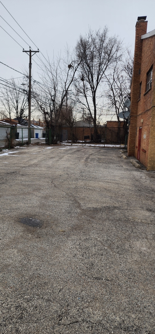9312 South Halsted Street Chicago, IL 60620 - Photo 5 of 32 a view of road with yard