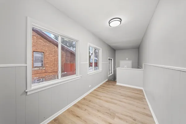 a view of livingroom with furniture wooden floor and window