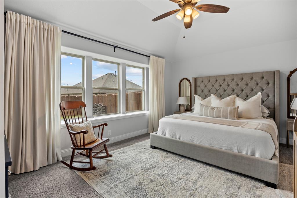 1084 Imperial Eagle Road Alvarado, TX 76009 - Photo 22 of 39 a bedroom with a bed chair and piano next to a window