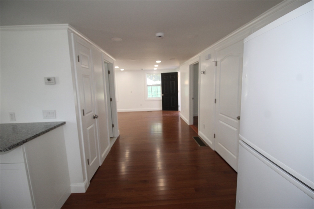 96 Walnut Lane, Unit B Attleboro, MA 02703 - Photo 12 of 20 a view of gallery with wooden floor