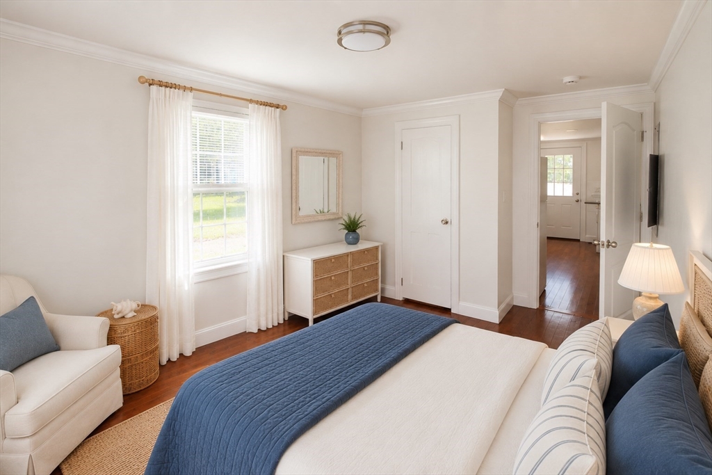96 Walnut Lane, Unit B Attleboro, MA 02703 - Photo 16 of 20 a bedroom with a bed and a couch