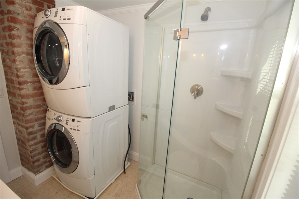 96 Walnut Lane, Unit B Attleboro, MA 02703 - Photo 7 of 20 a utility room with dryer and washer