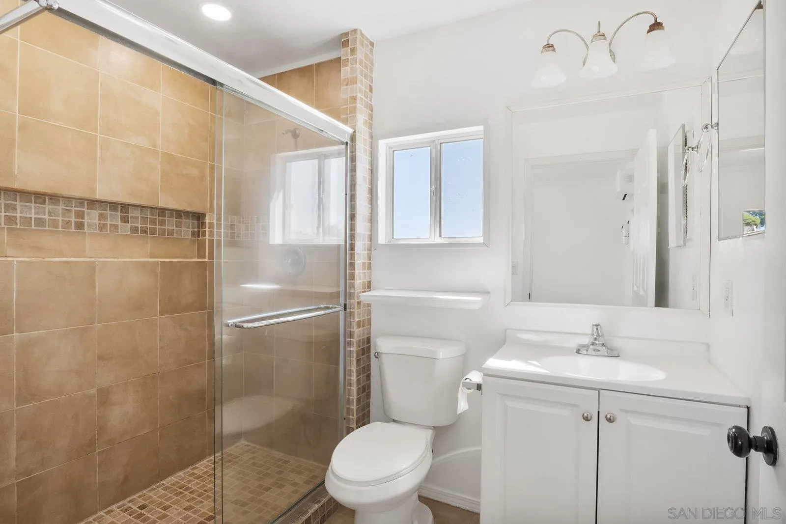 8545 Gardena Road Lakeside, CA 92040 - Photo 12 of 67 a bathroom with a sink a toilet and shower