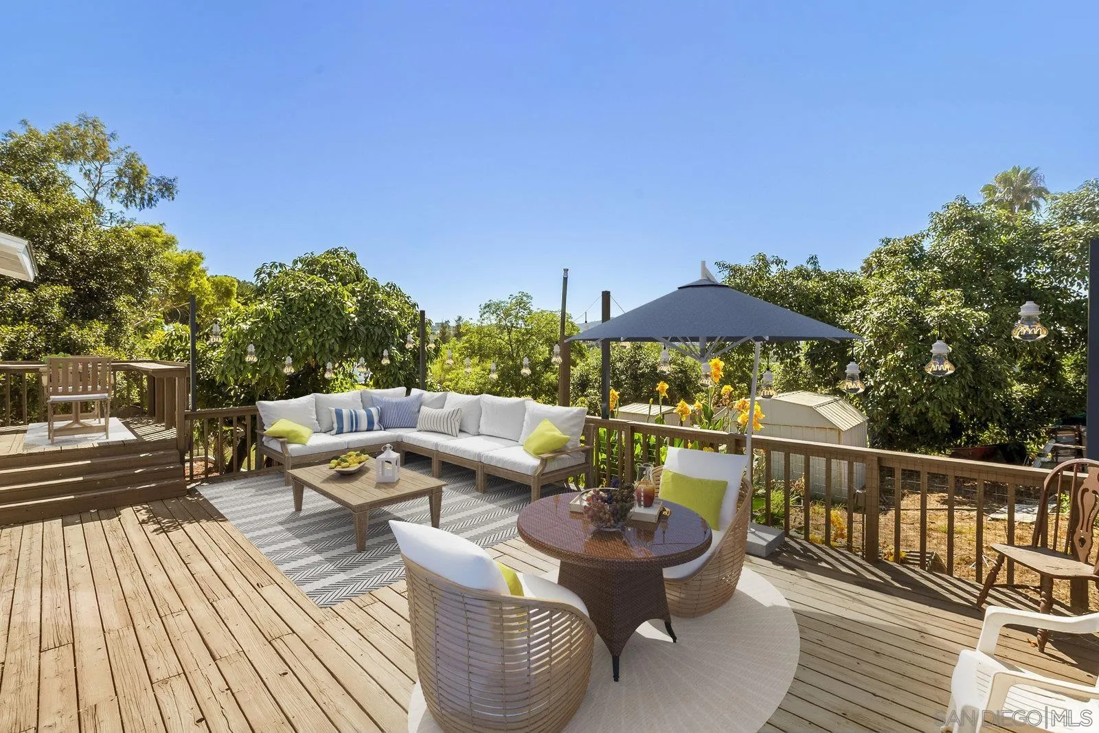 8545 Gardena Road Lakeside, CA 92040 - Photo 14 of 67 a view of balcony with furniture and umbrella