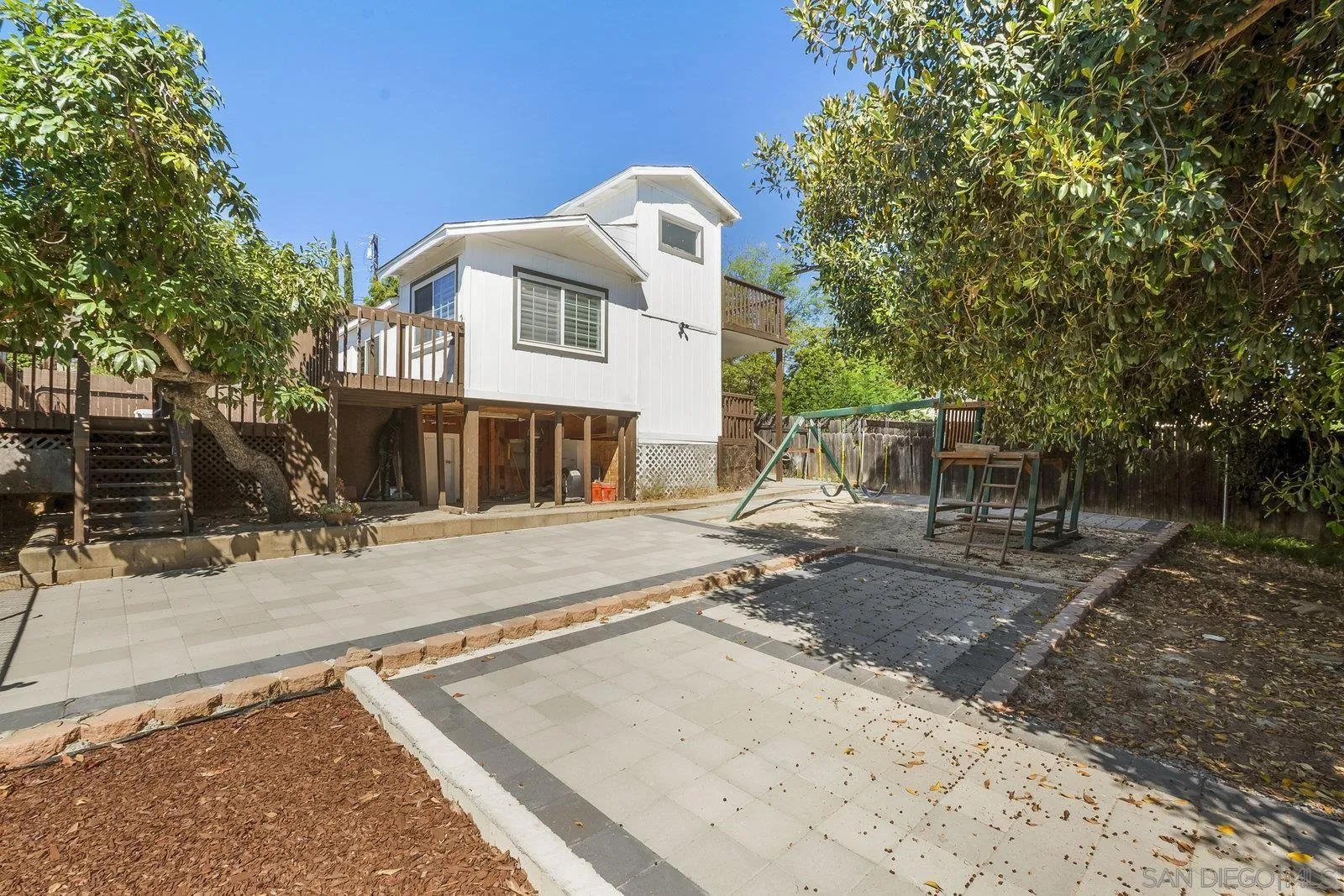 8545 Gardena Road Lakeside, CA 92040 - Photo 15 of 67 a front view of a house with a yard