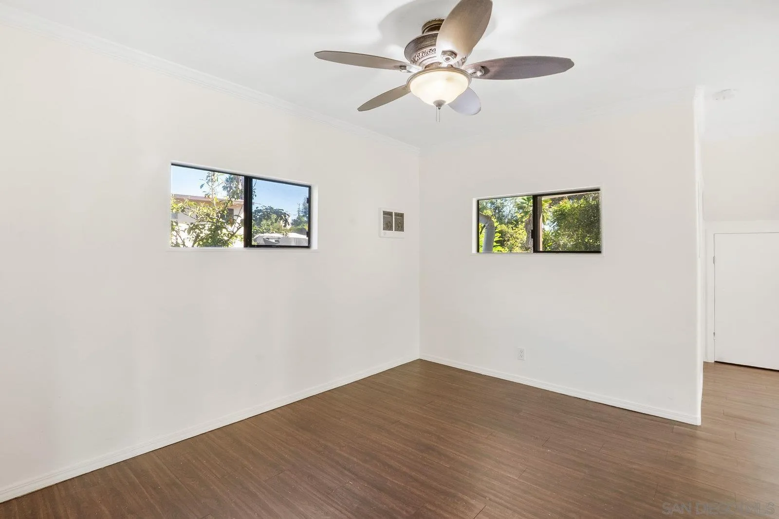 8545 Gardena Road Lakeside, CA 92040 - Photo 27 of 67 a view of an empty room with wooden floor