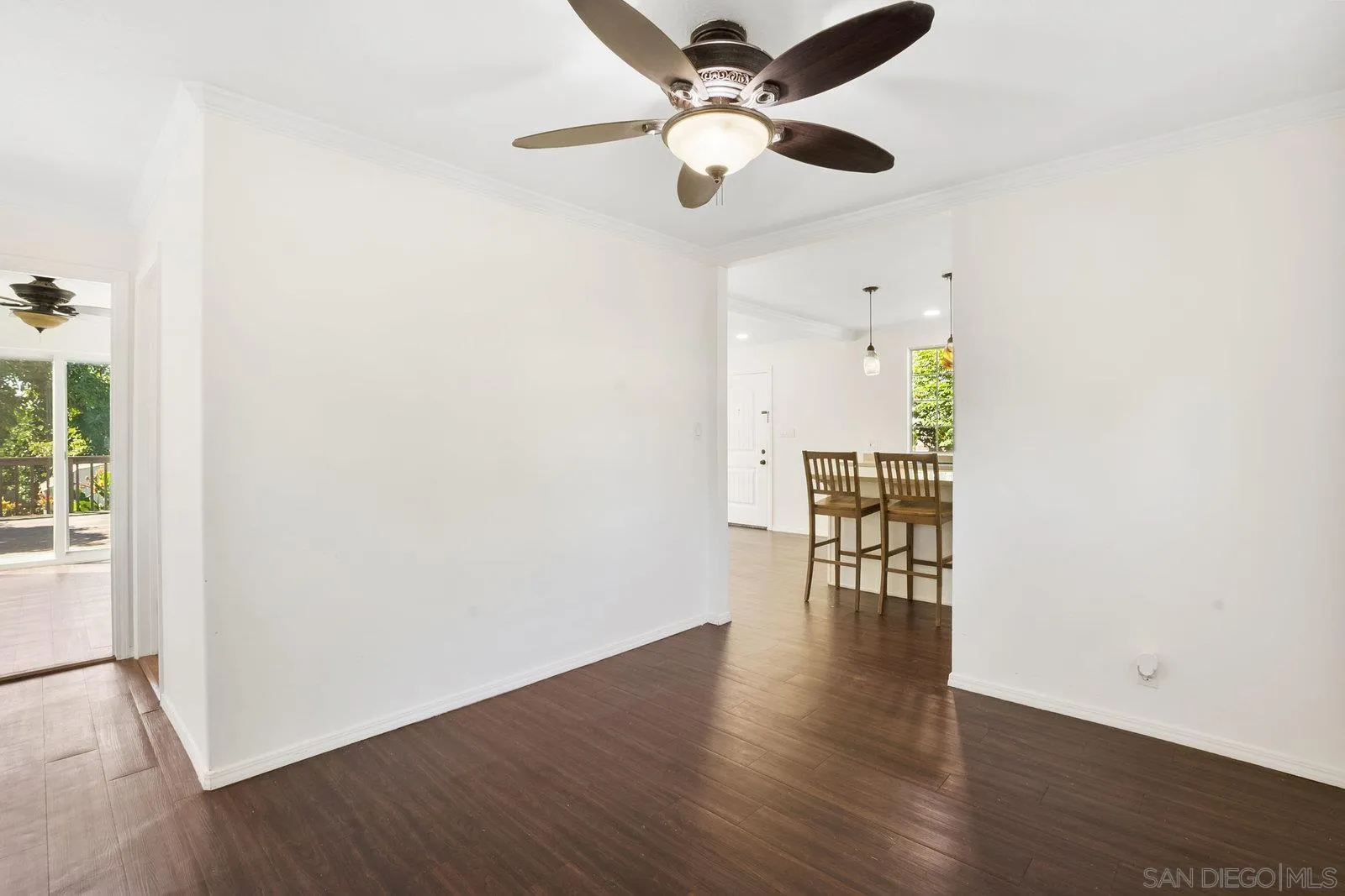 8545 Gardena Road Lakeside, CA 92040 - Photo 28 of 67 a view of a room with wooden floor and ceiling fan