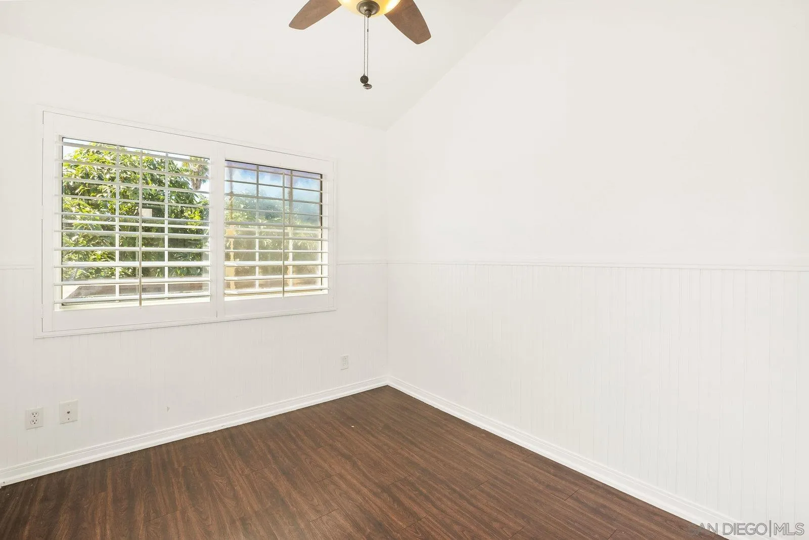 8545 Gardena Road Lakeside, CA 92040 - Photo 34 of 67 a view of an empty room with wooden floor and a window
