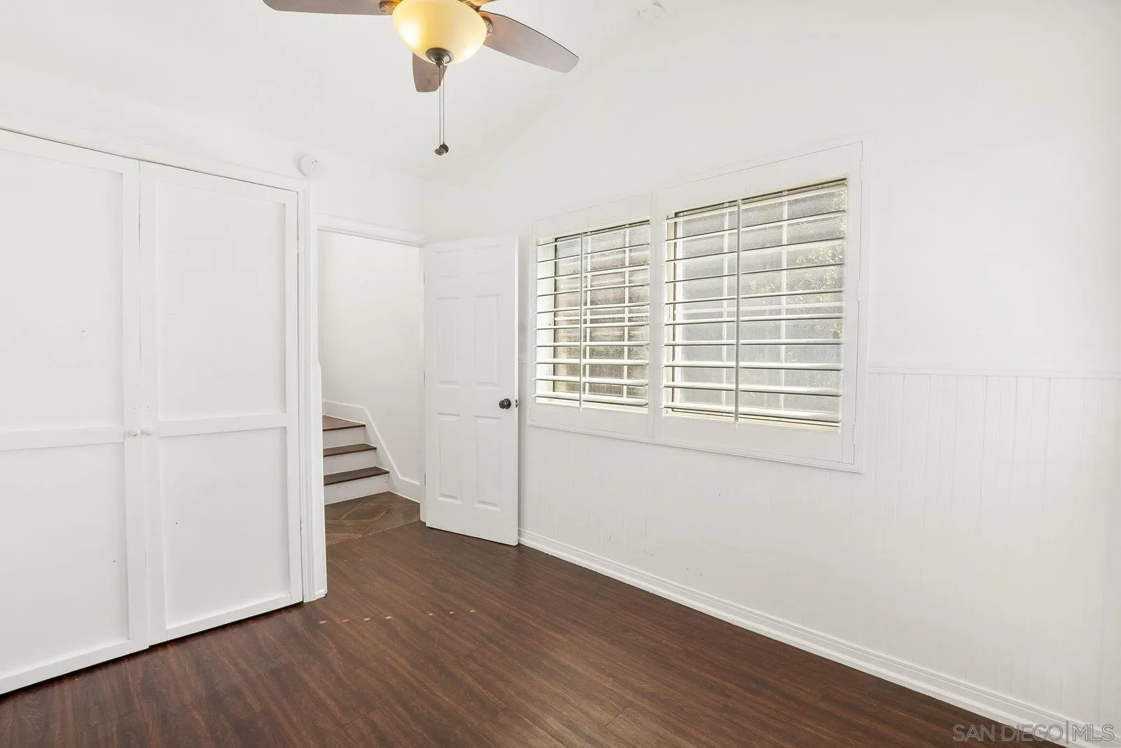 8545 Gardena Road Lakeside, CA 92040 - Photo 35 of 67 a view of an empty room with wooden floor and a window