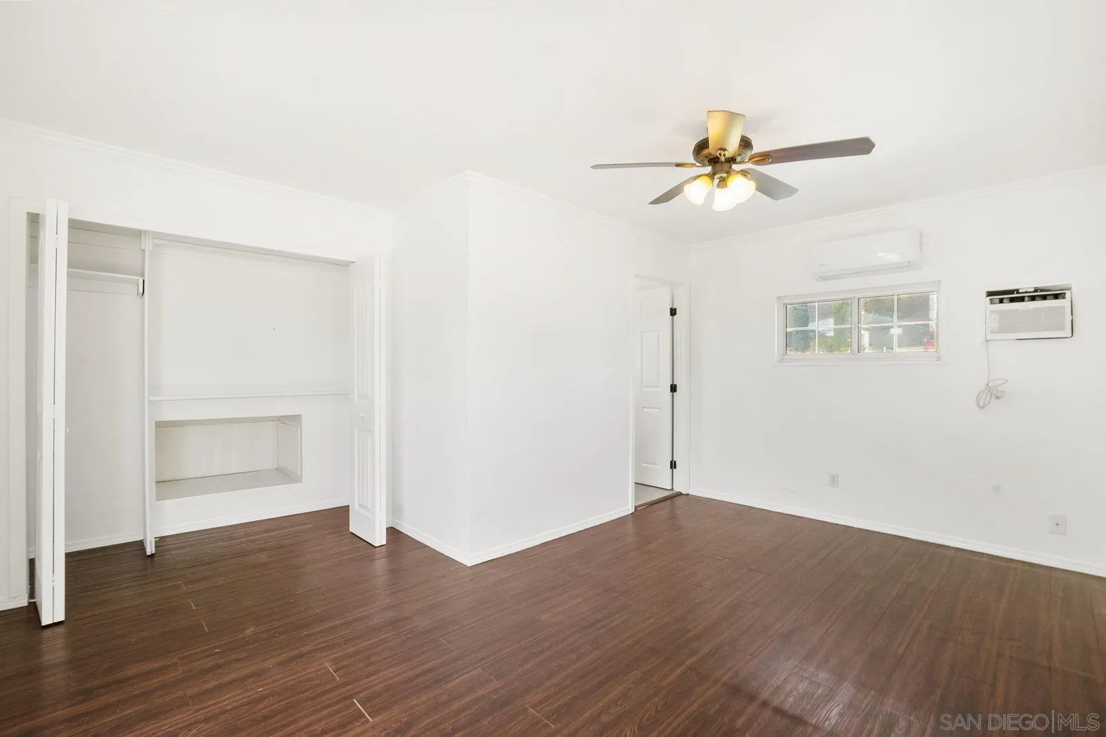 8545 Gardena Road Lakeside, CA 92040 - Photo 37 of 67 a view of empty room with wooden floor and fan