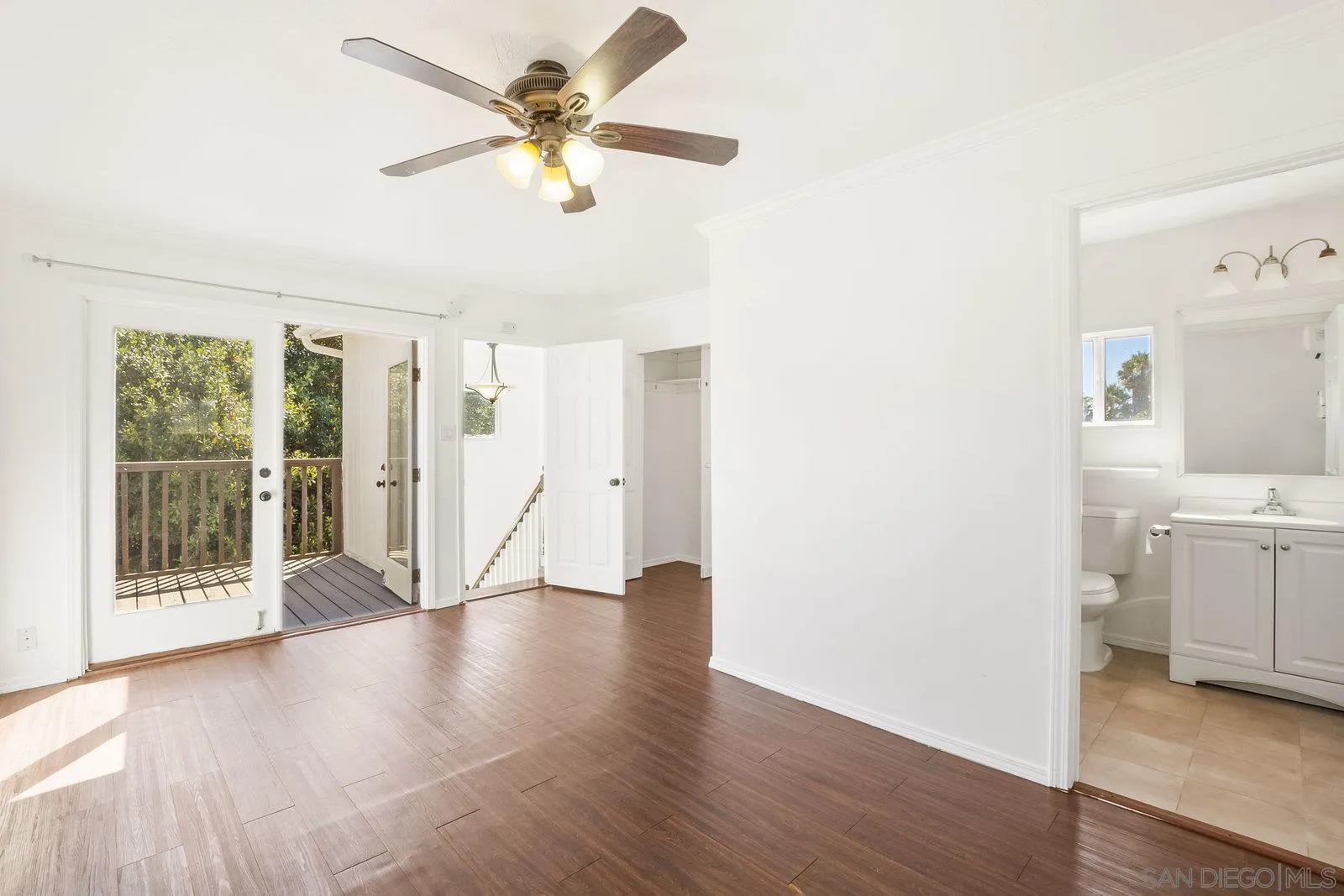 8545 Gardena Road Lakeside, CA 92040 - Photo 38 of 67 a view of an empty room with a window and wooden floor