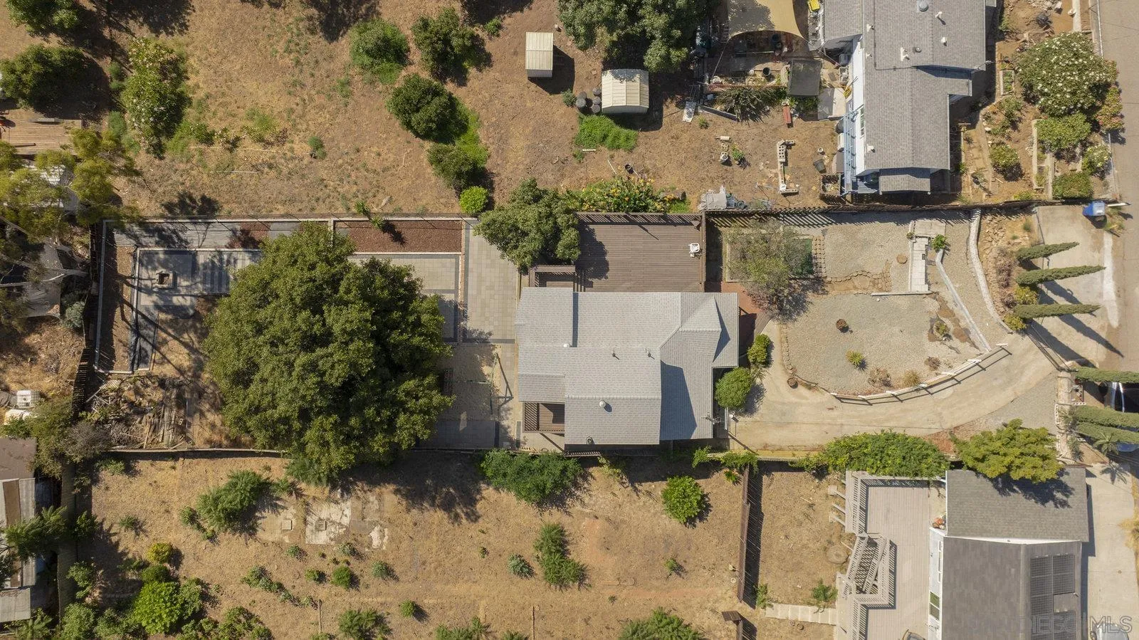 8545 Gardena Road Lakeside, CA 92040 - Photo 54 of 67 an aerial view of a house with a yard covered with snow