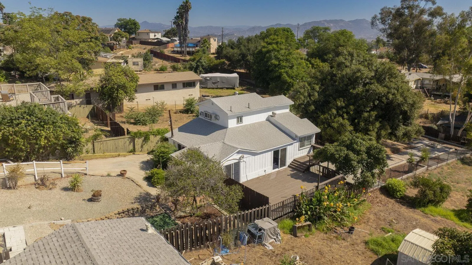 8545 Gardena Road Lakeside, CA 92040 - Photo 64 of 67 an aerial view of a house with a yard basket ball court and outdoor seating