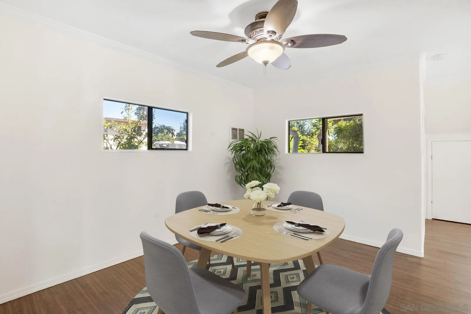8545 Gardena Road Lakeside, CA 92040 - Photo 7 of 67 a view of a dining room with furniture and wooden floor