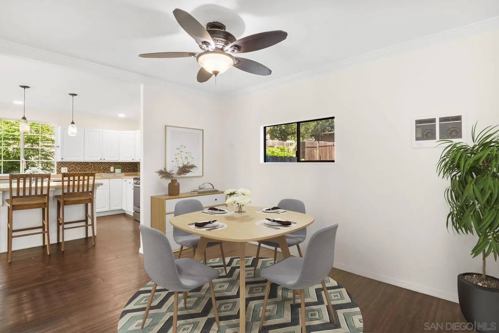 8545 Gardena Road Lakeside, CA 92040 - Photo 8 of 67 a view of a dining room with furniture and wooden floor