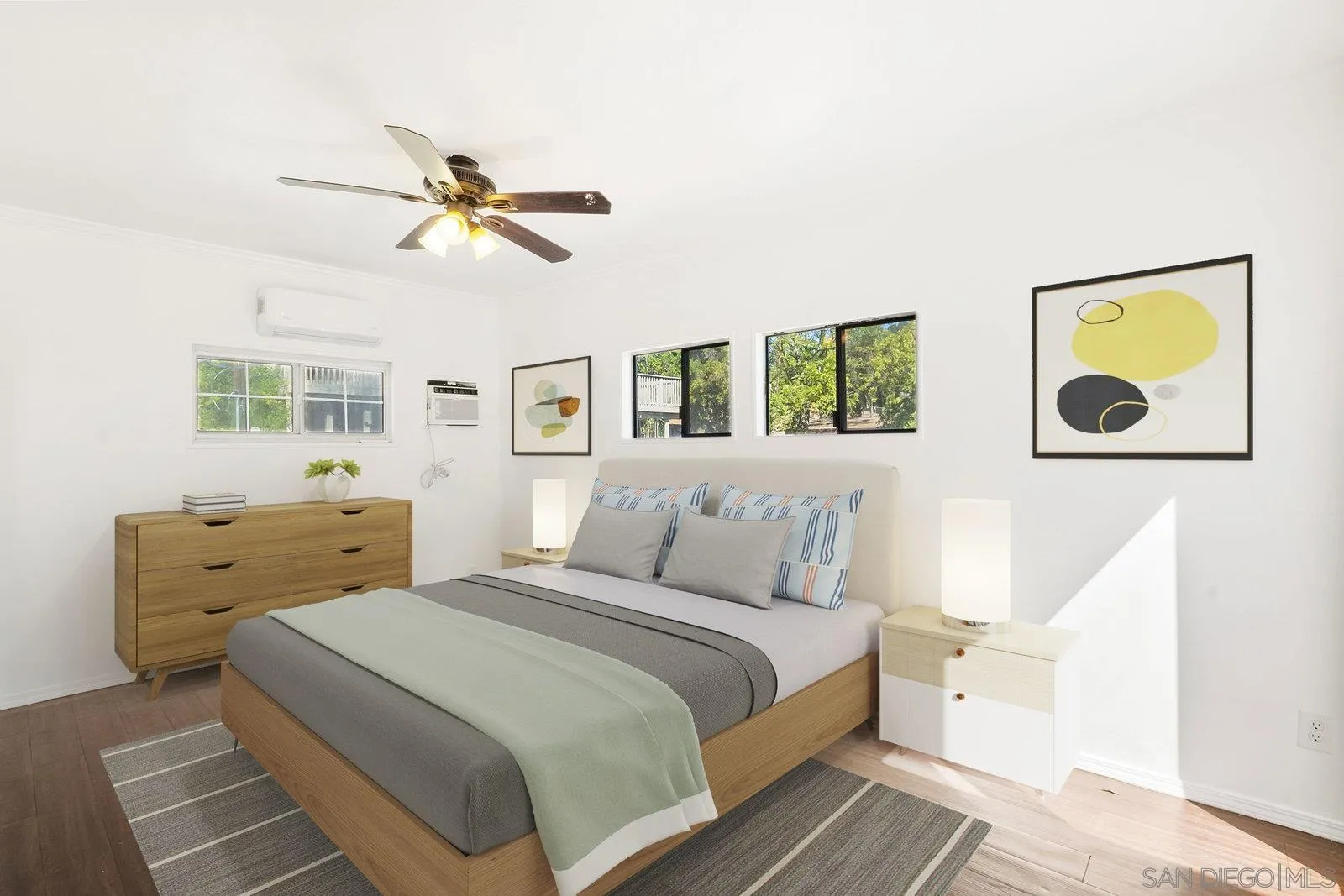 8545 Gardena Road Lakeside, CA 92040 - Photo 9 of 67 a bedroom with a bed and wooden floor