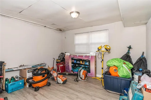 a storage room with furniture and toys