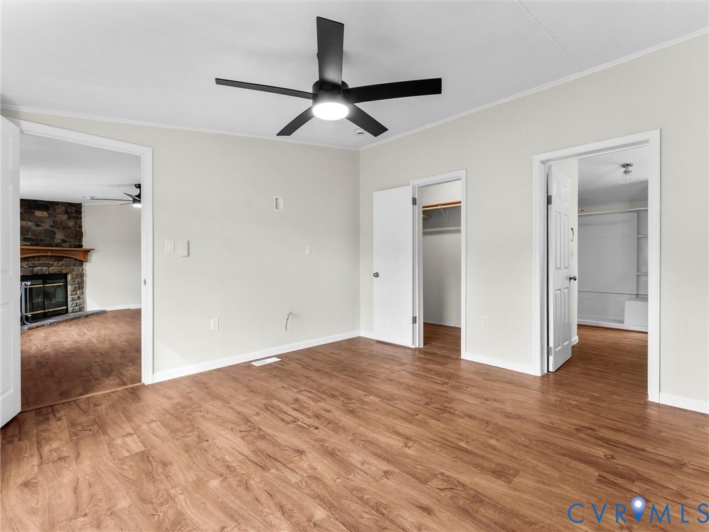 4772 Carsley Road Waverly, VA 23890 - Photo 14 of 38 Unfurnished bedroom with a spacious closet, crown