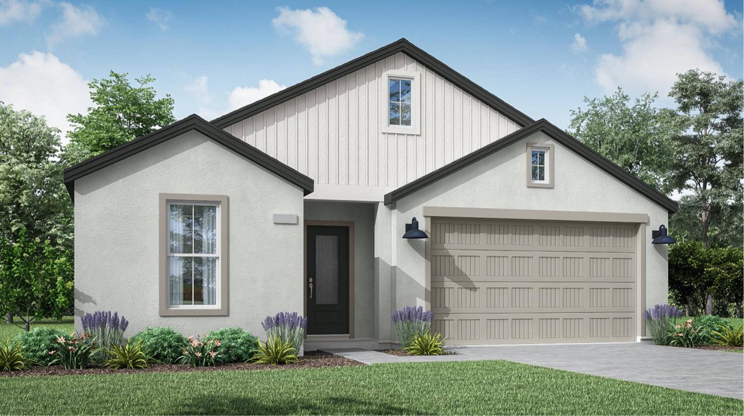 3924 Buttercup Road, Unit 12 Madera, CA 93636 - Photo 1 of 18 a front view of a house with a yard and garage