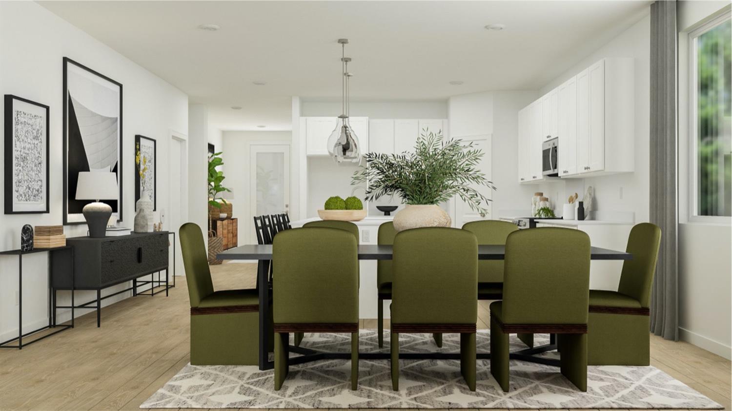 3924 Buttercup Road, Unit 12 Madera, CA 93636 - Photo 5 of 18 a view of a dining room with furniture and a potted plant