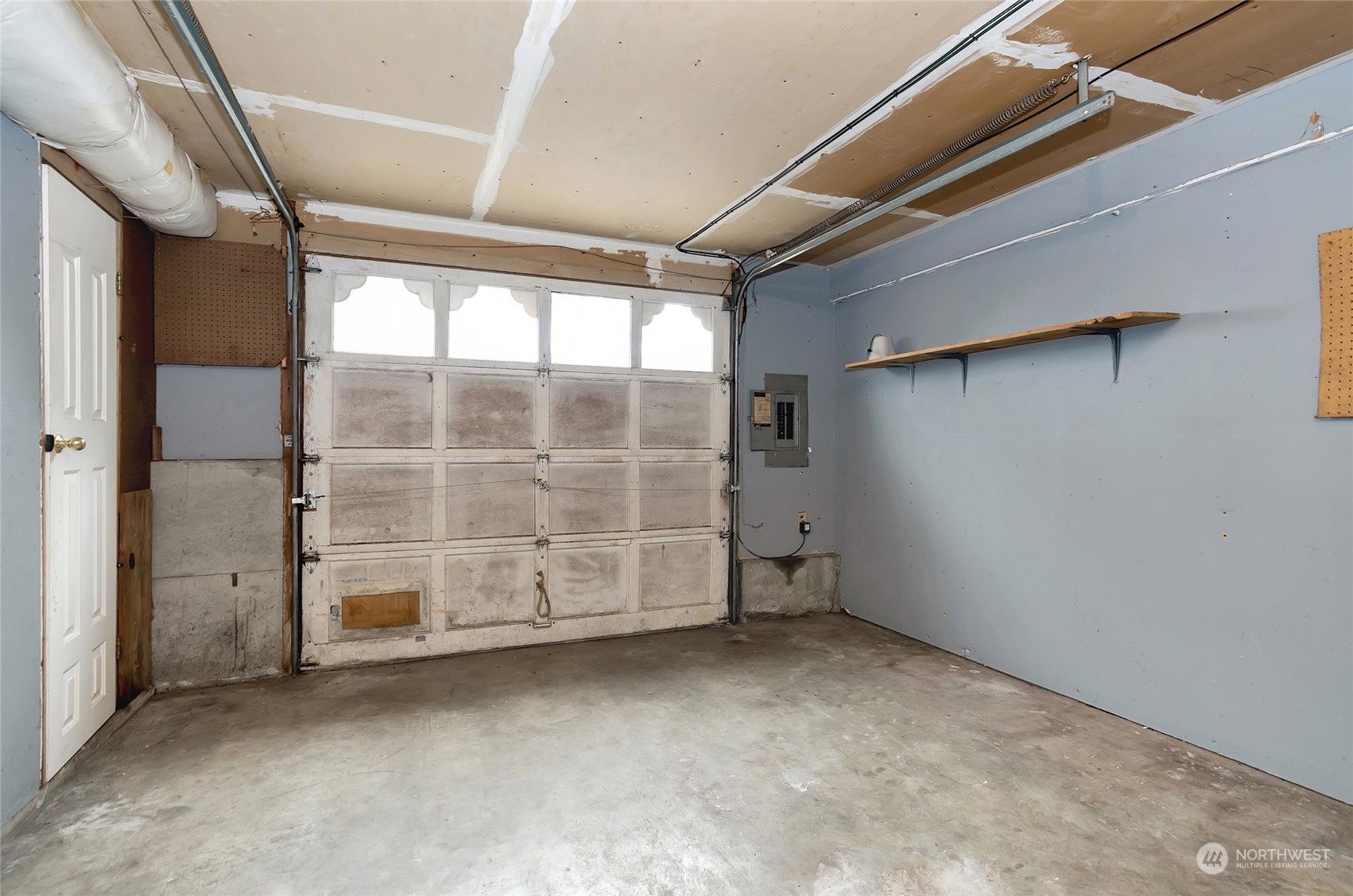 3006 Morrison Road West University Place, WA 98466 - Photo 30 of 32 a view of a room with wooden walls