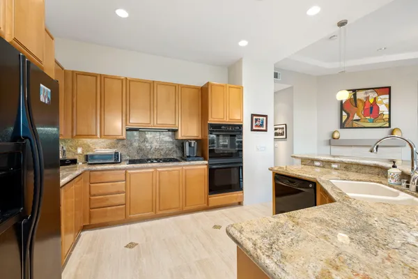 an aerial view of a house with a garden