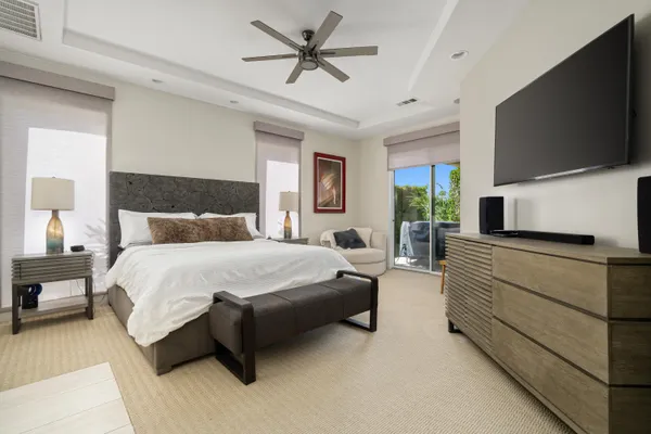 a outdoor dining space with furniture and city view