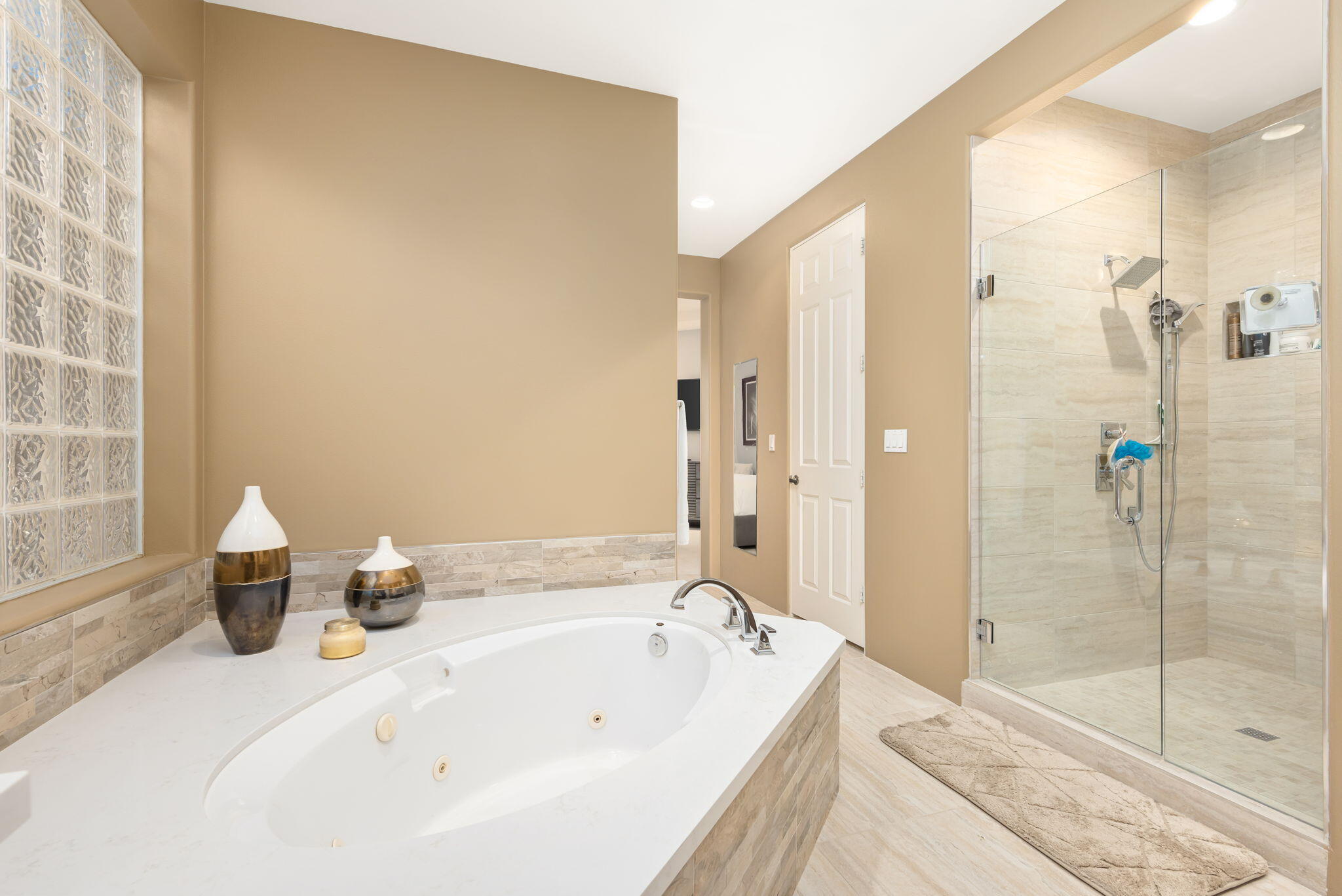 79440 Azahar La Quinta, CA 92253 - Photo 26 of 37 a bathroom with a tub and shower