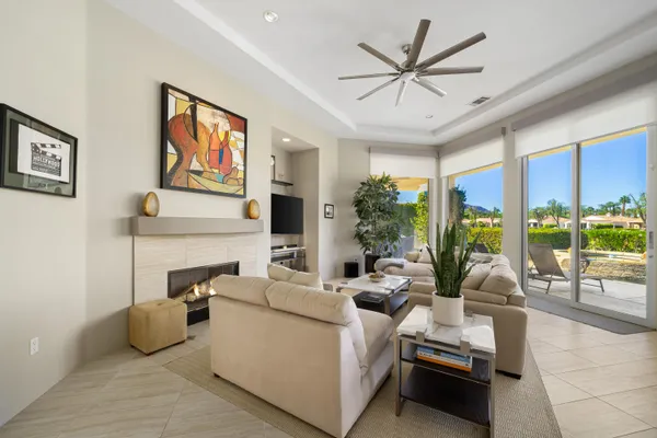 a living room with large windows