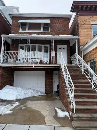 a front view of house with street